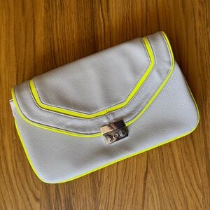 Like new beige/neon trim clutch